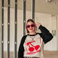 CHERRY BOMB RAGLAN KNIT SWEATER